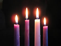 Fourth advent candle lit